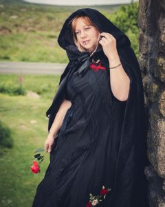 black dress and cloak
